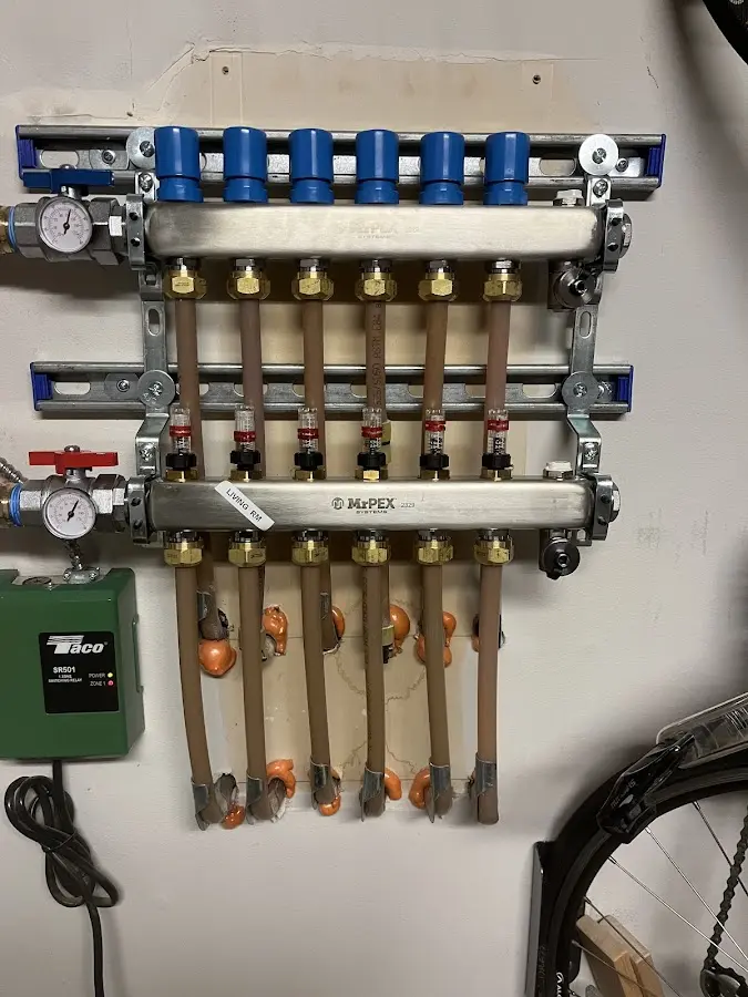 Plumber performing Gas Line Installation at a residential property in Ralpho